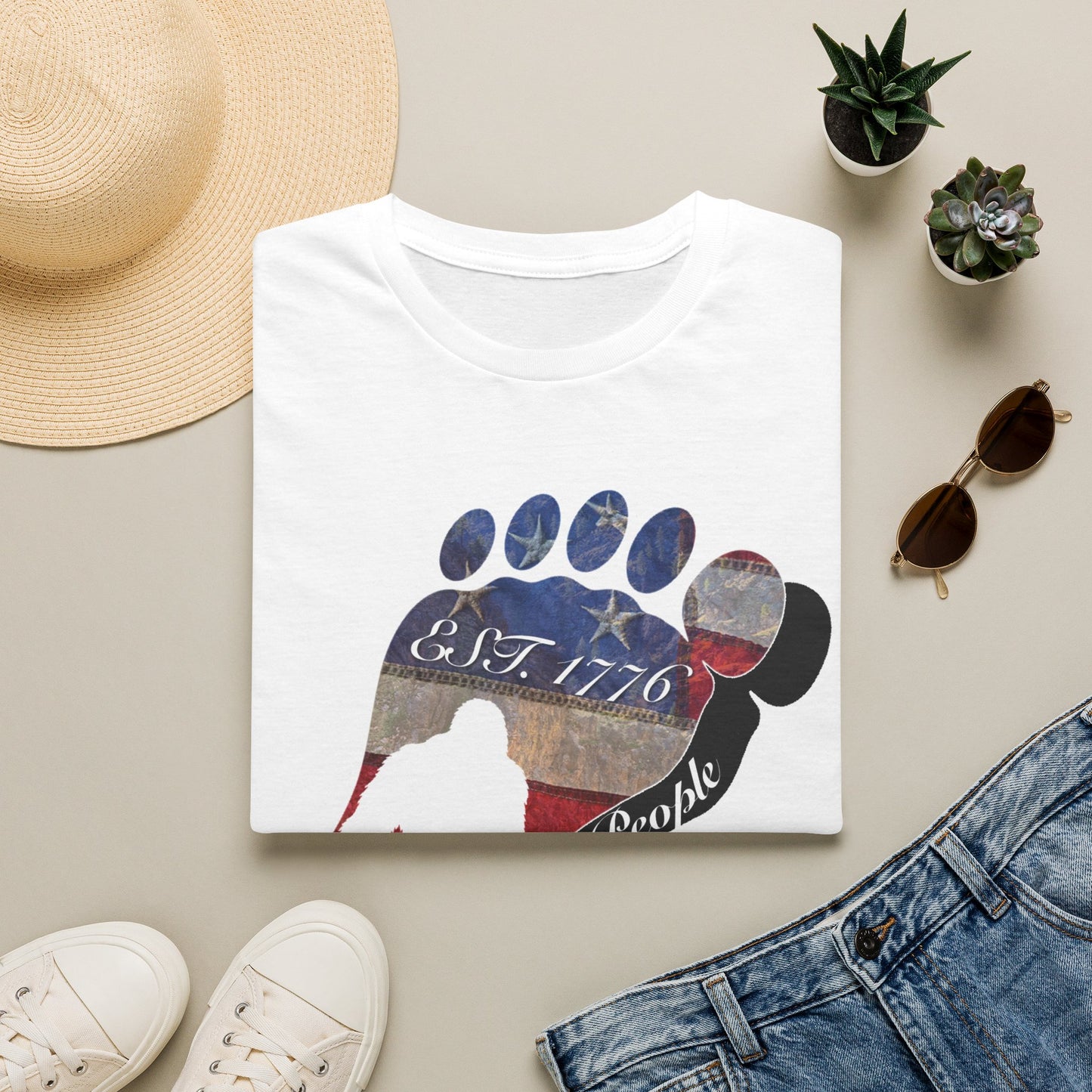 Going Norther Bigfoot T-Shirt — Footprint Silhouette with Distressed Flag "EST. 1776 - We The People"