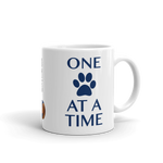 He's not a what? He's a Vizsla 11oz. white ceramic mug view of "One paw at a time"