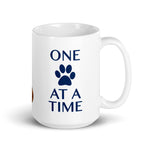 He's not a what? He's a Vizsla line art white 15oz. ceramic mug showing "One paw at a time"